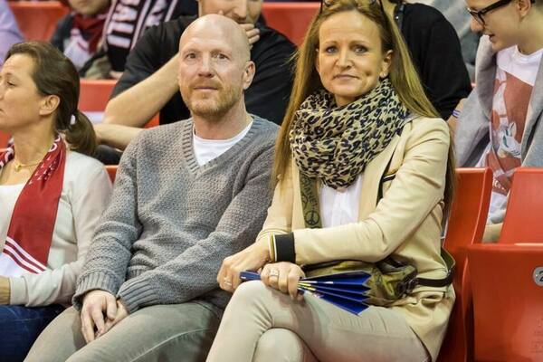 С женой Карин на баскетбольном матче в Мюнхене
